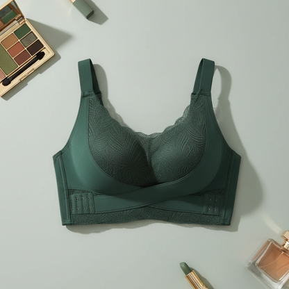 Green bra on a light gray background with makeup items around