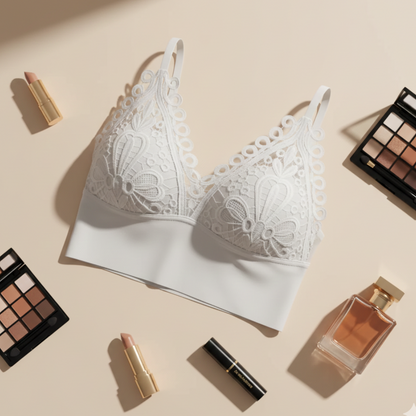 White lace bra with makeup products on a beige background